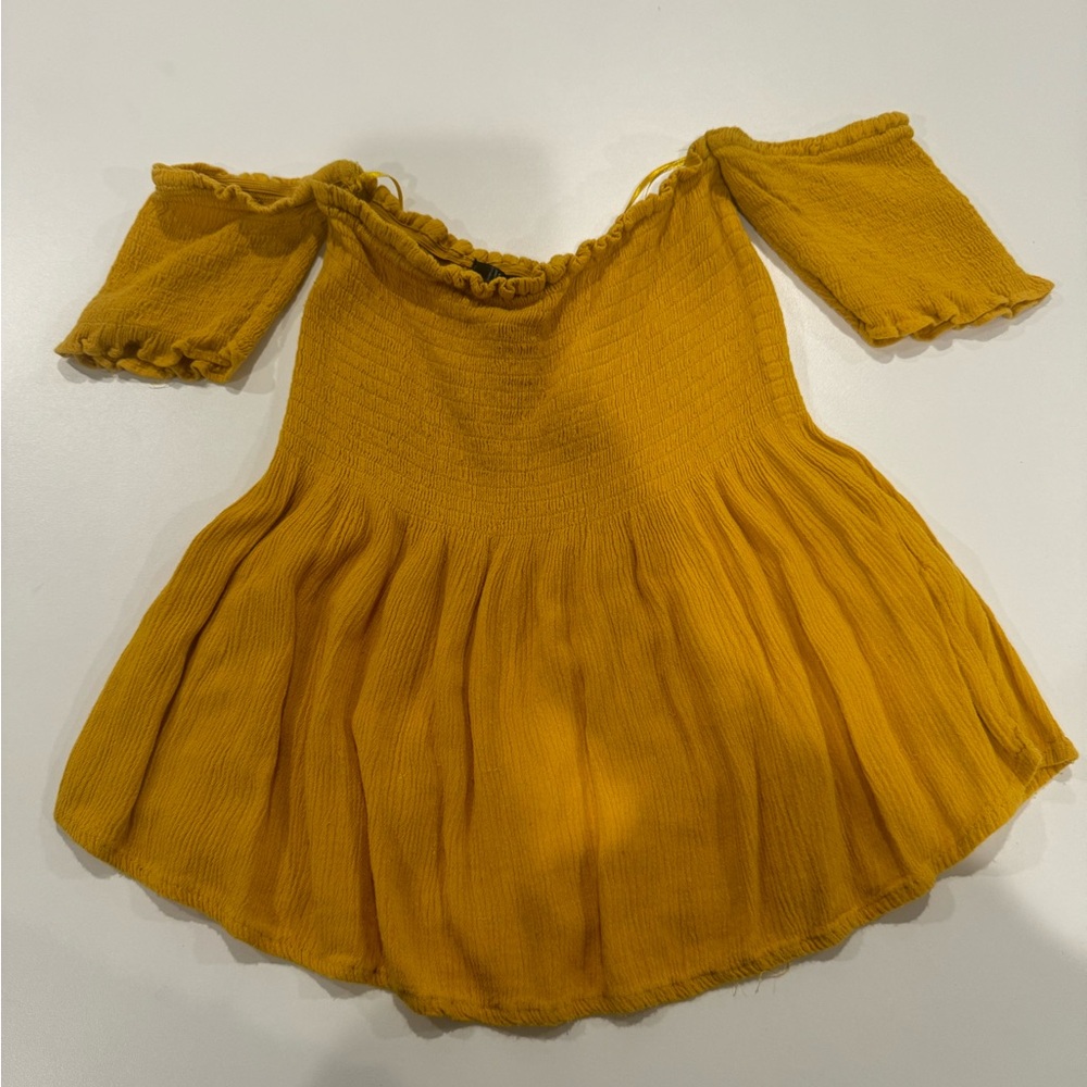 2/$20 Streetwear Society Mustard Ruffled smocked off the shoulder top - Picture 1 of 8
